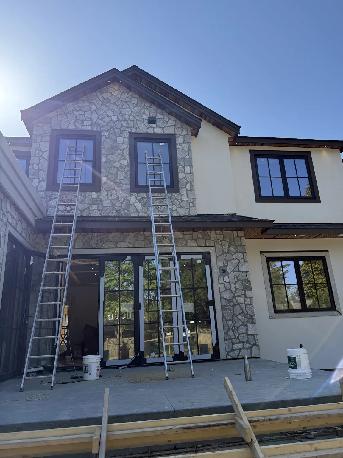 Large modern home exterior painting project